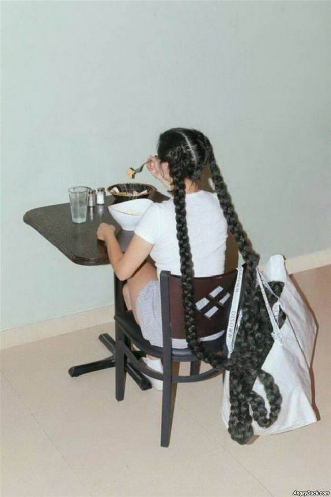 Her Hair Is So Long She Needs A Bag